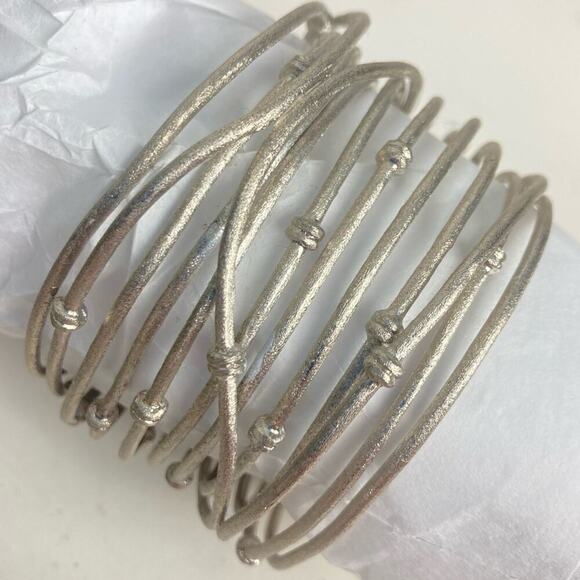 RIVKA Knotted Mina White Rhodium Cuff Bracelet - $229. - Picture 9 of 16